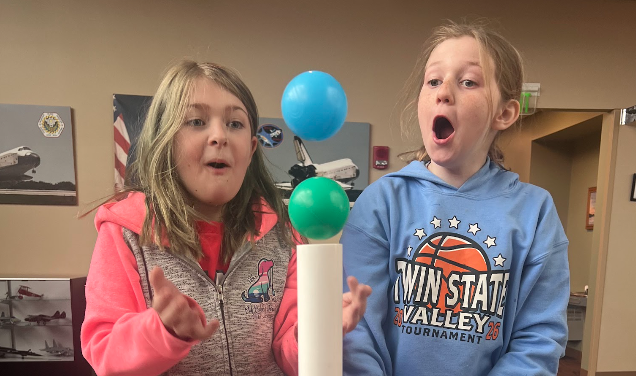 Photos of students doing a science experiment